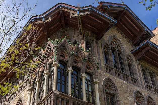 Neo-Gothic house, it looks like an enchanted mansion, Facades and traditional architecture in the old town of Barcelona, Spain