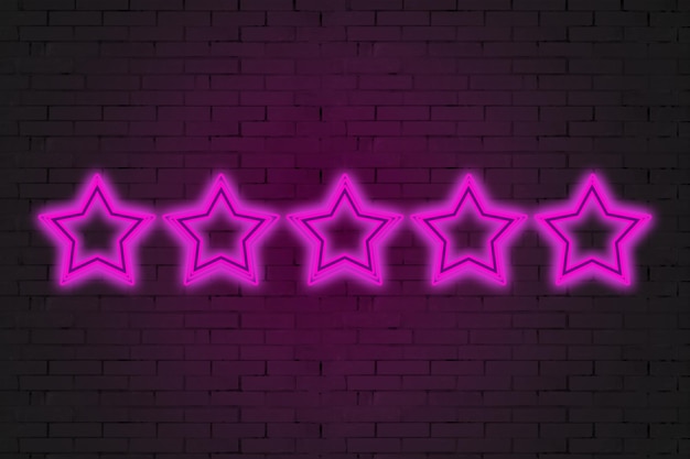Neon five stars on a brick wall
