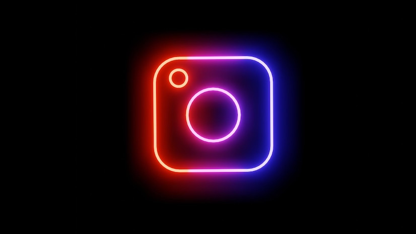 Premium Photo | Neon glowing instagram logo image on black background