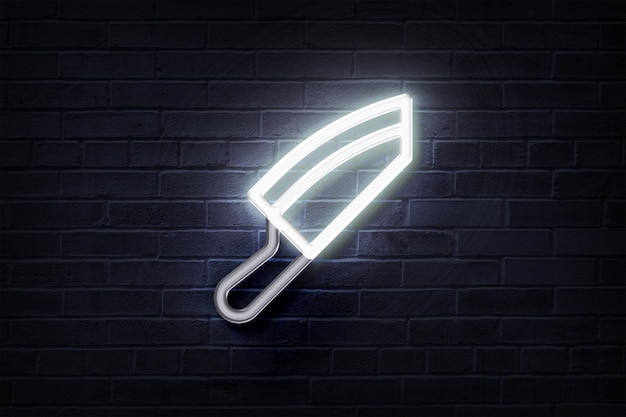 Neon Knife on a brick wall