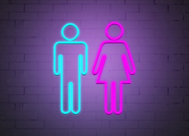 Photo neon signs of men and women on the background of a brick wall.