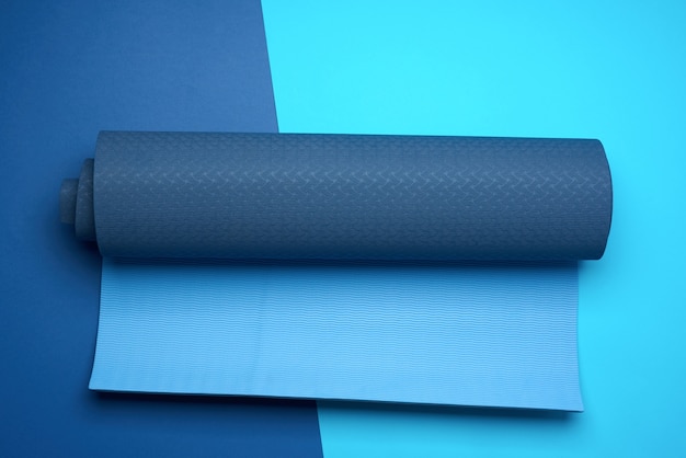 Neoprene blue twisted mat lies on a blue background