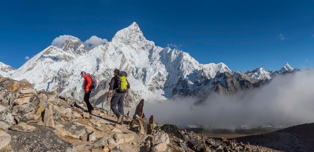 Nepal, Himalaya, Khumbu, Everest region, Trekkers and Nuptse