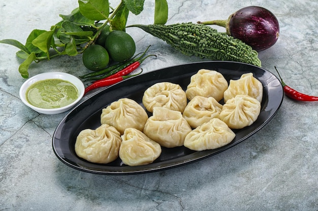 Nepali steamed dumplings momo with sause