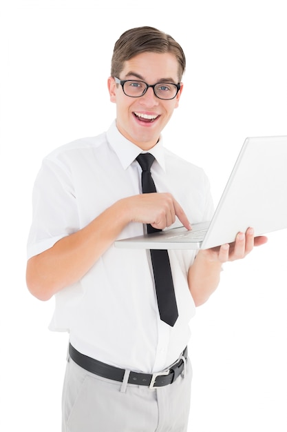 Nerdy businessman holding his laptop 