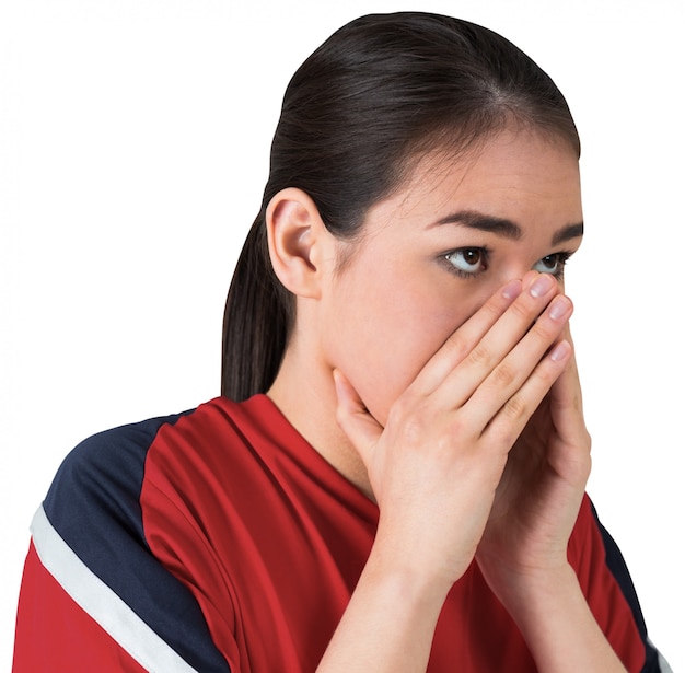 Nervous football fan looking ahead