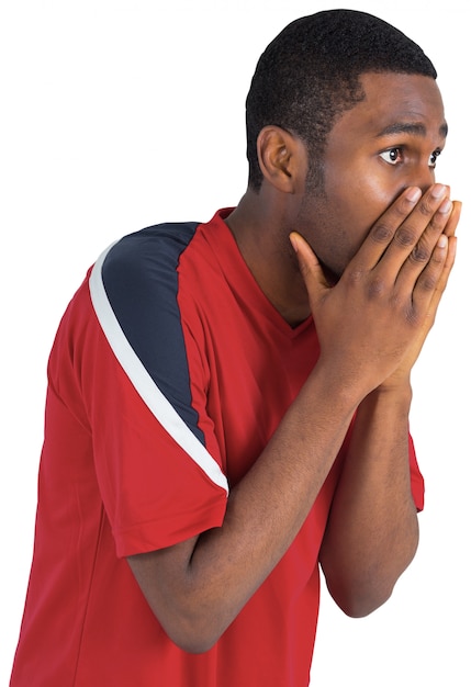 Nervous football fan looking ahead