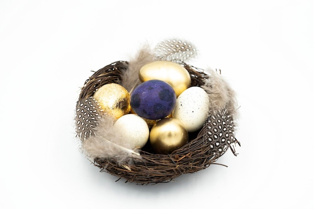 Nest, Easter golden and white eggs