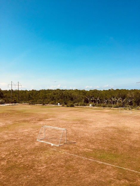 Photo net on land against blue sky