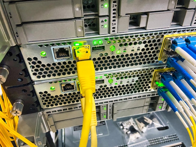 Photo network equipment with green lights working in a data center