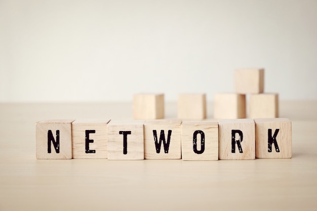 Network word on wooden cubes background