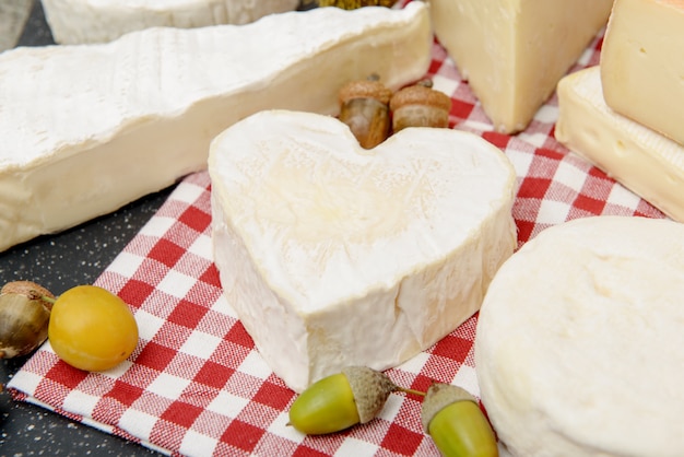 Neufchatel cheese on a red and white towel