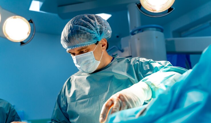 Photo neurosurgeon is operating with medical robotic surgery machine. modern automated medical device.
