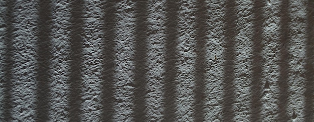 Нейтральный фон с низкой контрастностью. Серый фон с абстрактной каменной текстурой. Текстура штукатурки для фона.