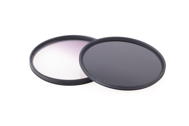 Neutral density and gradient optical filters on a white background