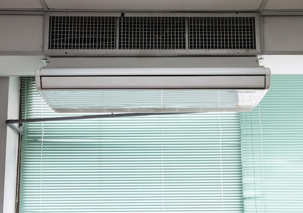 New air conditioner unit is hanging on the ceiling.