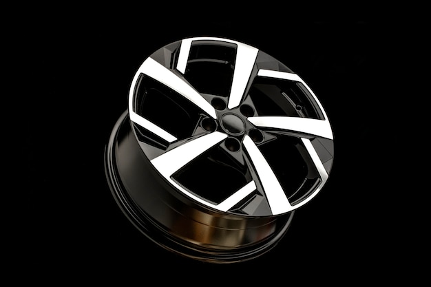 New alloy wheels on a black background. stylish and beautiful. auto parts and auto tuning.