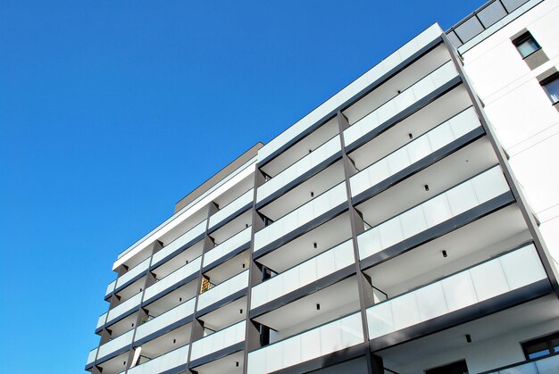 New apartment building with glass balconies modern architecture houses by the sea