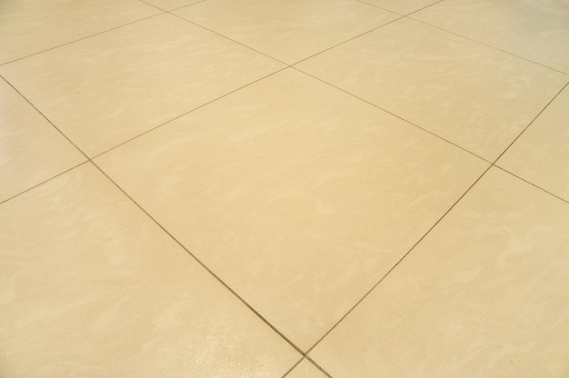 New beautiful sandstone texture background of ceramic wall and floor tiles in perspective