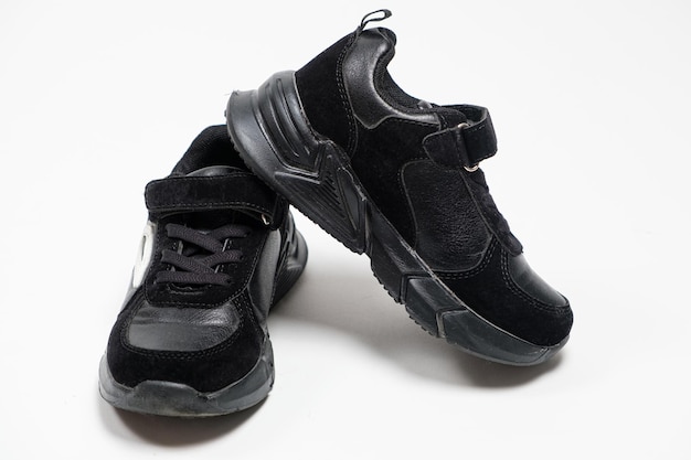 New black children's sneakers for preschoolers on a white background