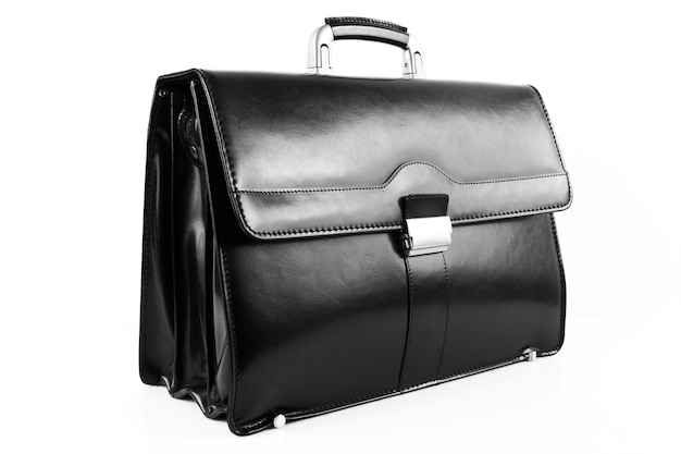 New black leather briefcase over white background