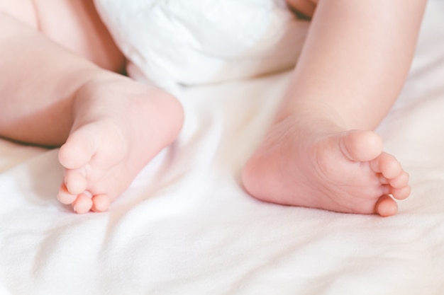 Новорожденные ноги младенца