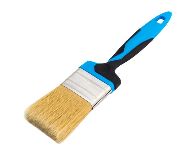 New brush with a blue plastic handle on a white background. Isolated object