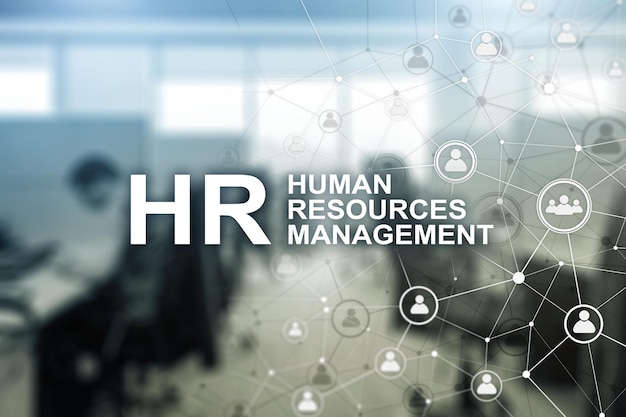 New Business Concept Human Resources Managemen Inscription on the background on blurry office