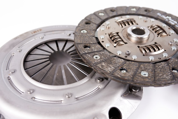 New car clutch kit isolated on white. Close up