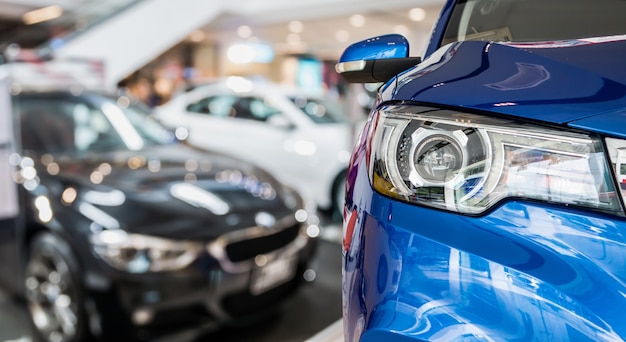 New cars in dealer showroom interior