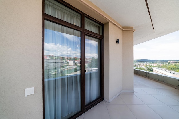 New clean balcony with large floortoceiling windows