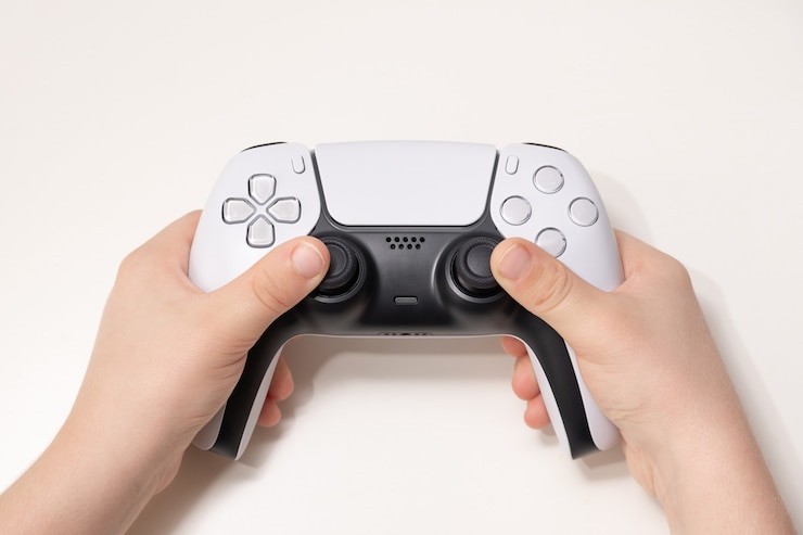 Photo new next gen game controller on kids hand.