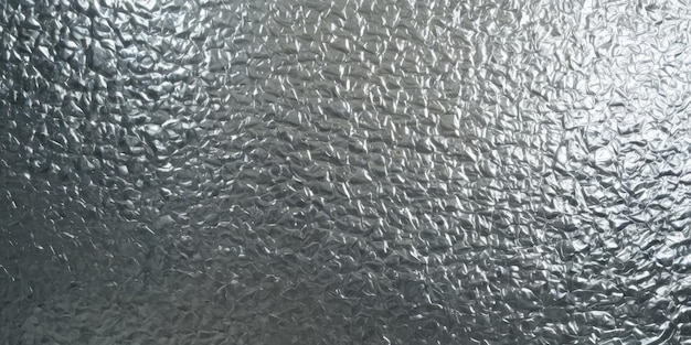 Фото new glossy silver foil texture for background