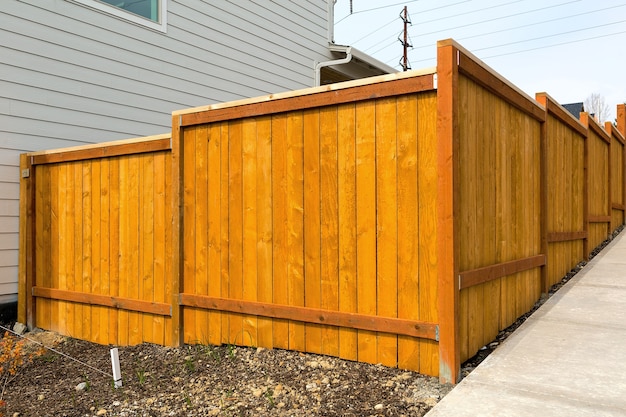 New home backyard wood fence construction