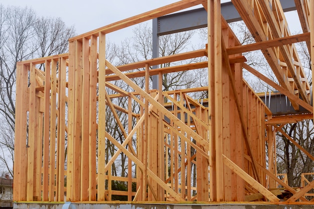 Photo new home construction framing of a house on clear day