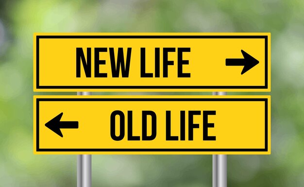 New life or old life road sign on blur background