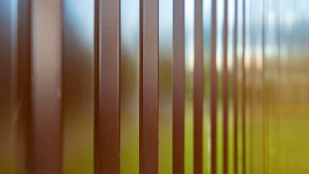 New metal fence with plain mirror surface extreme close view