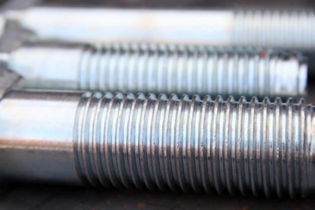 New metal screw Industrial background