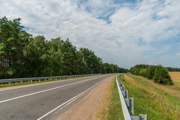 New modern asphalt in rural areas highquality conditions for\
business development in the field of cargo transportation and\
logistics