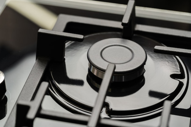 Photo new modern shining metal gas cooker close up