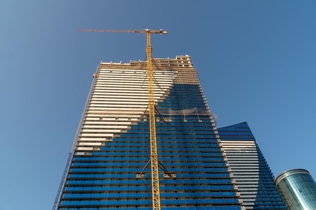 New multifamily houses against the blue sky