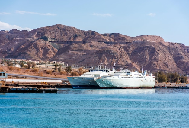 New pleasure boats moored off the coast of Aqaba in Jordan