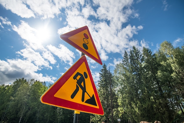 new road signs on a blue sky background