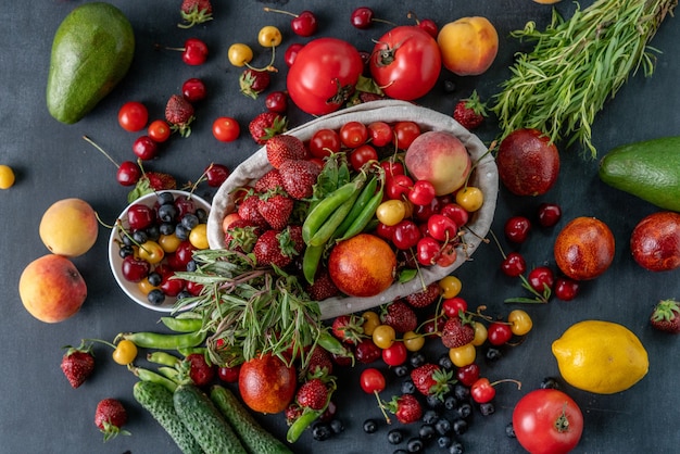 New seasonal variety of fresh fruits and vegetables grocery in basket