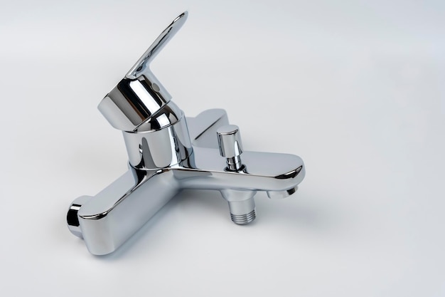 New shiny bath faucet on a white background Bath mixer