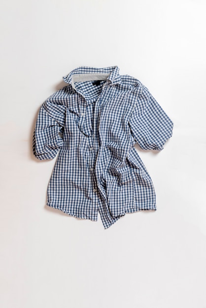 A new simple checkered classic casual shirt flat lay, view from above