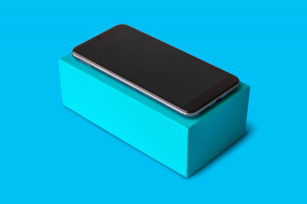 New smartphone on blue background for mockup