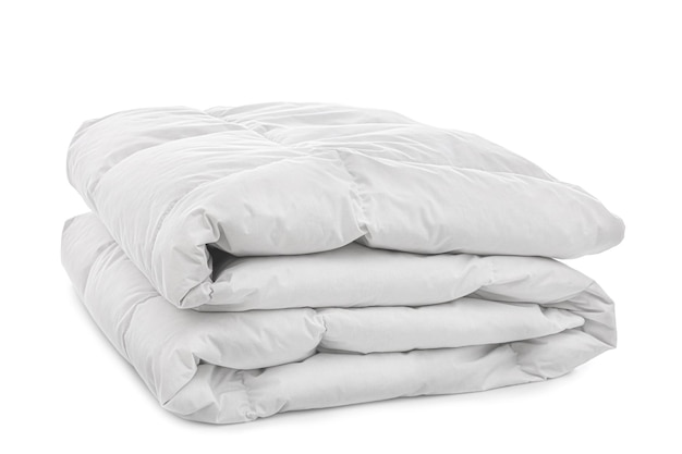 Новое мягкое сложенное одеяло, изолированное на белом