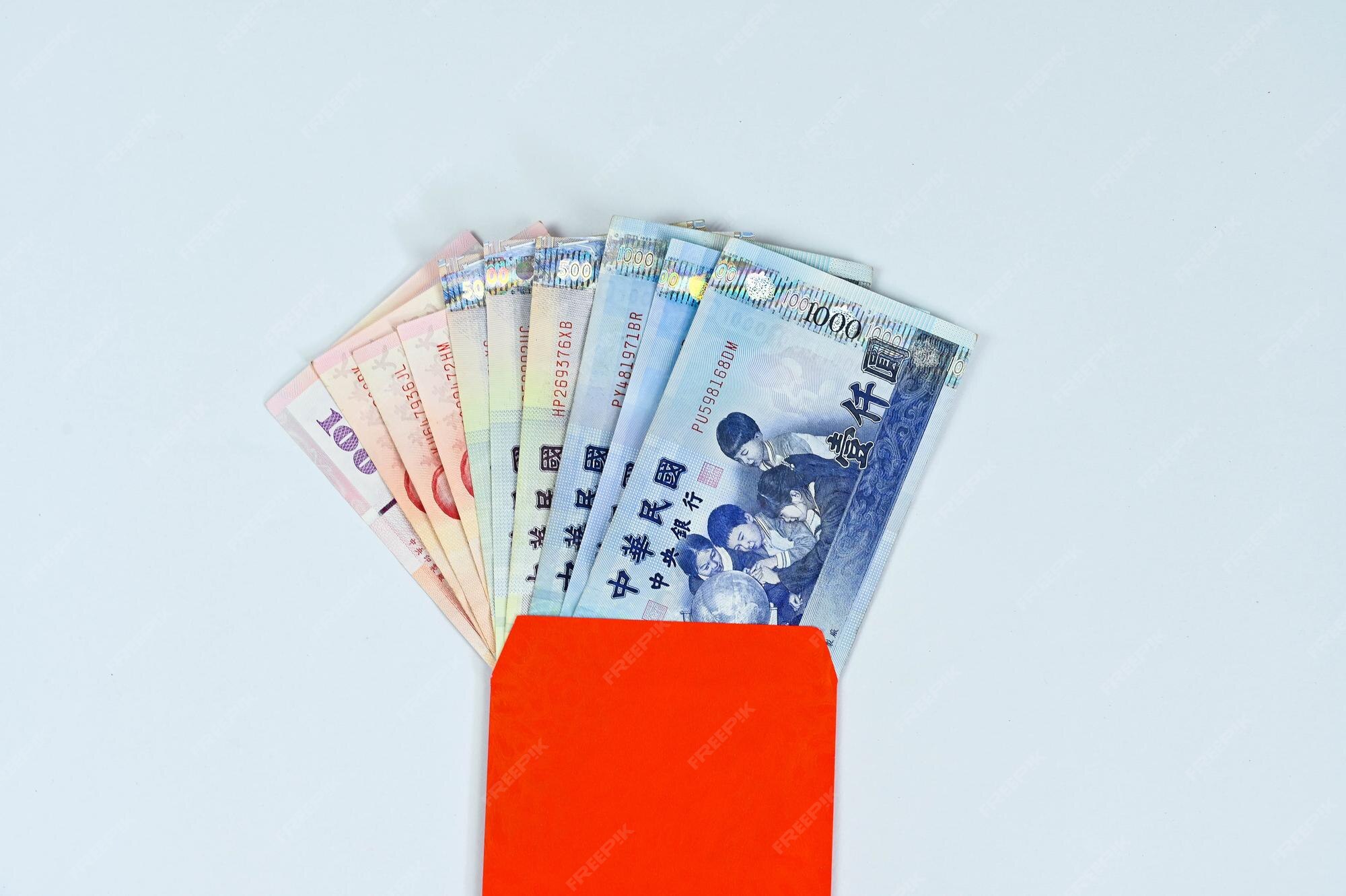 Premium Photo New Taiwan Dollars In Red Envelopes premium-photo-new-taiwan-dollars-in-red-envelopes