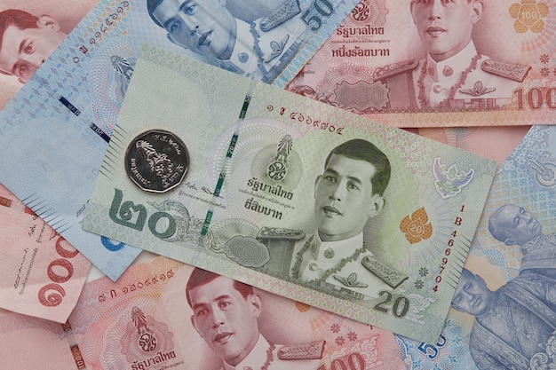 Photo new thai baht on white background